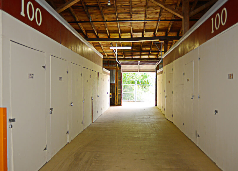 A hallway of storage units at Rocky Mount Self Storage